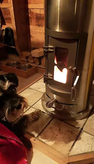 tiny kimberly wood stove in cabin